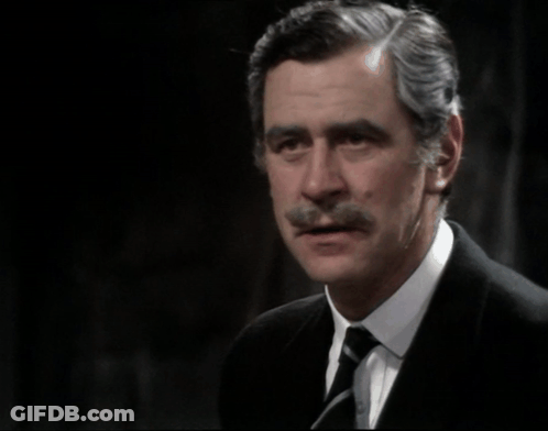 A Man In A Suit And Tie With The Words " They 'Re Not Half The Men They Were " Above Him GIF