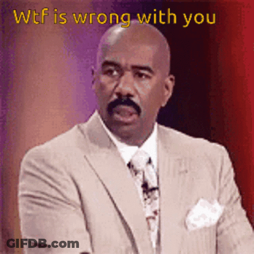 A Man In A Suit And Tie With The Words Wtf Is Wrong With You GIF