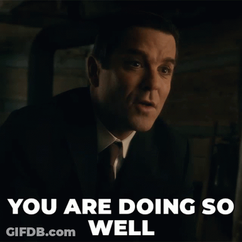 A Man In A Suit And Tie With The Words You Are Doing So Well Below Him GIF
