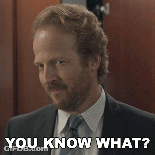 A Man In A Suit And Tie With The Words You Know What Above Him GIF