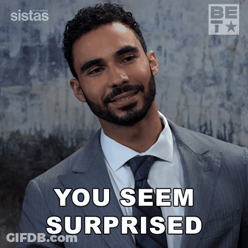 A Man In A Suit And Tie With The Words You Seem Surprised Below Him GIF