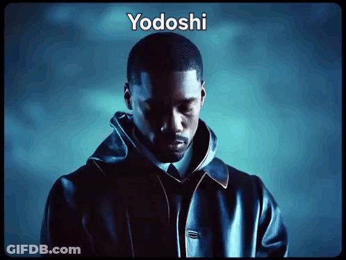 A Man In A Suit And Tie With Yodoshi Written On The Top GIF