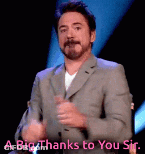 A Man In A Suit Applauds With The Words " A Big Thanks To You Sir " Below Him GIF