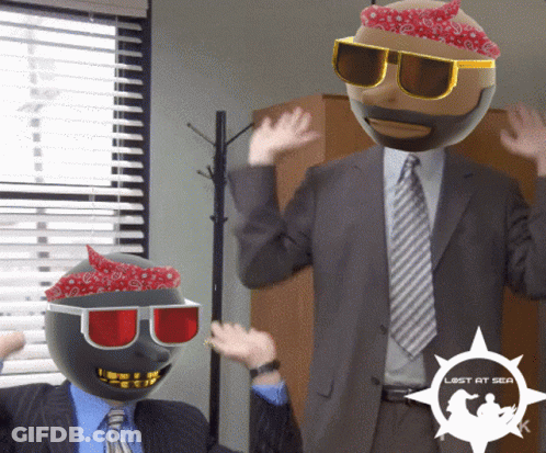 A Man In A Suit Has A Bandana On His Head And Sunglasses GIF