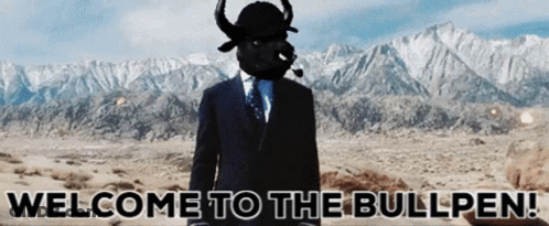 A Man In A Suit Has A Bull Mask On His Head And The Words Welcome To The Bullpen Below Him GIF