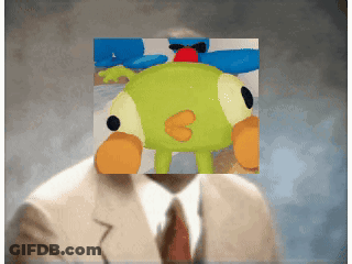 A Man In A Suit Has A Picture Of A Stuffed Animal On His Head GIF