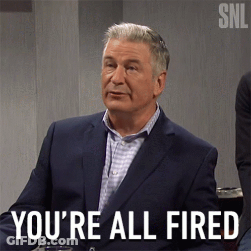 A Man In A Suit Has The Words You 'Re All Fired Written On His Face GIF