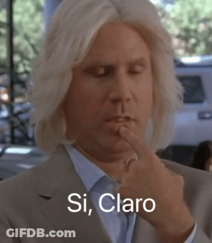 A Man In A Suit Holds His Finger To His Mouth And Says Si Claro In White Letters GIF