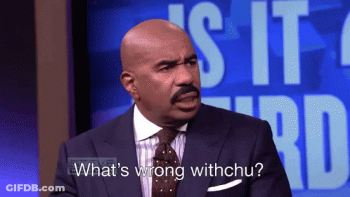 A Man In A Suit Is Asking What 'S Wrong Withchu GIF