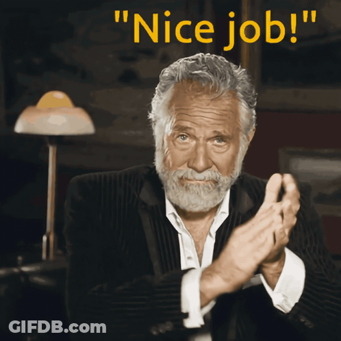 A Man In A Suit Is Clapping With The Words " Nice Job " Behind Him GIF