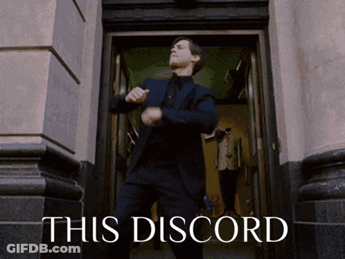 A Man In A Suit Is Dancing In A Doorway With The Words This Discord Behind Him GIF