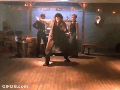 Man In Suit Dancing In Texas Room GIF