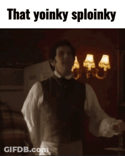 A Man In A Suit Is Dancing In A Room With The Words `` That Yoinky Sploinky '' Above Him . GIF