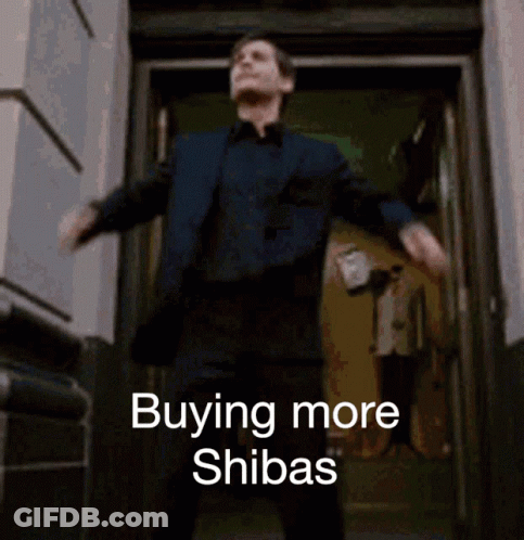 A Man In A Suit Is Dancing In Front Of A Door That Says Buying More Shibas On It GIF