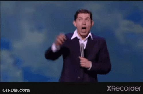 A Man In A Suit Is Dancing On A Stage With The Words " My Future Lies With Him " GIF