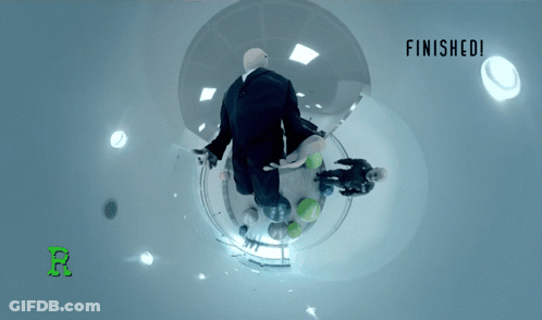 A Man In A Suit Is Flying Through A Bubble With The Words Finished Below Him GIF
