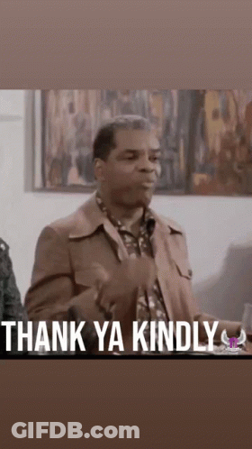 A Man In A Suit Is Giving A Thumbs Up With The Words `` Thank Ya Kindly '' . GIF