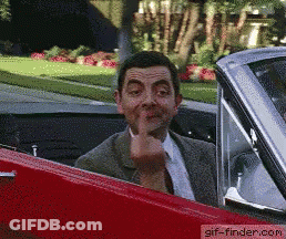 A Man In A Suit Is Giving The Middle Finger GIF