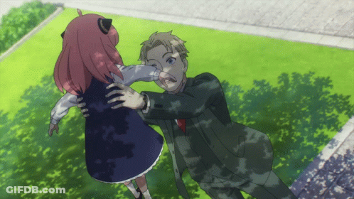 A Man In A Suit Is Holding A Girl In A Pink Dress GIF