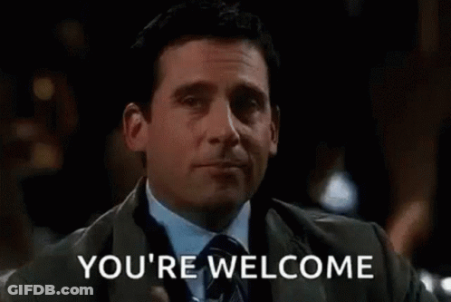 Man In Suit Holding Whiskey Saying You're Welcome GIF