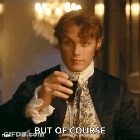 A Man In A Suit Is Holding A Glass Of Wine And Saying But Of Course . GIF