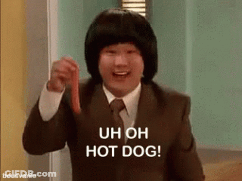 A Man In A Suit Is Holding A Hot Dog And Saying `` Uh Oh Hot Dog '' . GIF