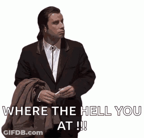 A Man In A Suit Is Holding A Jacket And Says Where The Hell You At !!! GIF