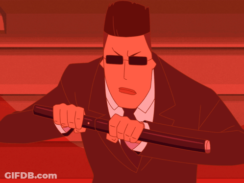 A Man In A Suit Is Holding A Large Knife GIF