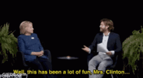 A Man In A Suit Is Holding A Piece Of Paper And Says What 'S The Best Way To Reach You GIF