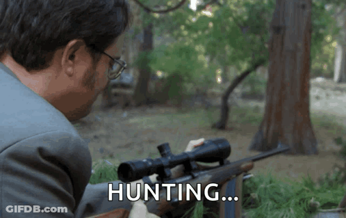 Man In Suit Holding Rifle Hunting GIF