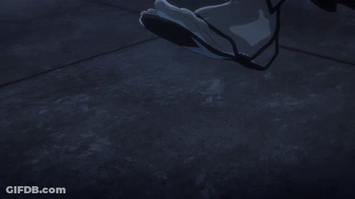 A Man In A Suit Is Holding A Sword GIF
