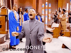 A Man In A Suit Is Kneeling Down In A Church With His Arms Outstretched And Shouting . GIF