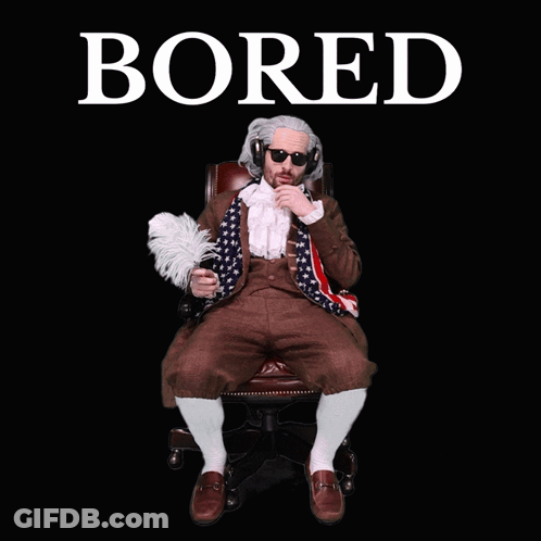 A Man In A Suit Is Laying In A Chair With The Word Bored Above Him GIF