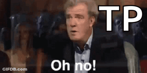 A Man In A Suit Is Making A Funny Face And Saying Oh No ! GIF