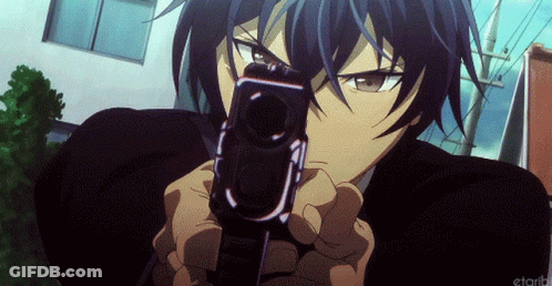 A Man In A Suit Is Pointing A Gun At The Camera .. GIF