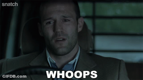 A Man In A Suit Is Saying Whoops In A Car GIF