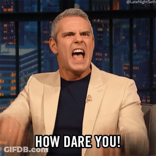 A Man In A Suit Is Screaming And Saying How Dare You . GIF