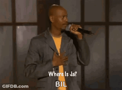 A Man In A Suit Is Singing Into A Microphone And Says Where Is Jabil GIF