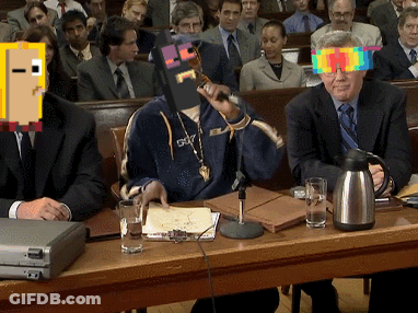 A Man In A Suit Is Sitting At A Table With A Briefcase And Glasses On It GIF