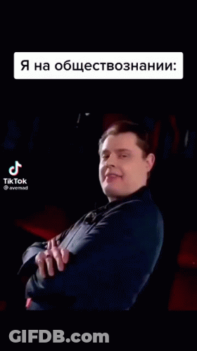 Smiling Man In Suit With Arms Crossed GIF
