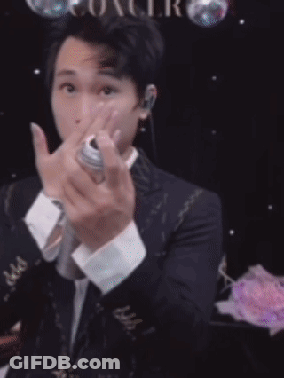 A Man In A Suit Is Spraying Something With The Words Have A Great Start In The New Week .. GIF