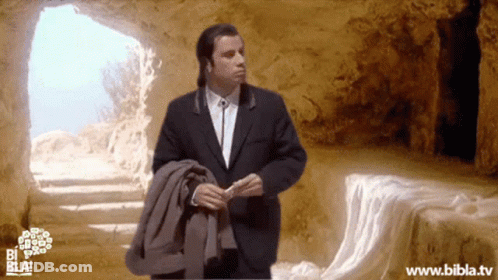 A Man In A Suit Is Standing In A Cave With The Website Www.bibla.tv On The Bottom GIF