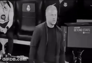 A Man In A Suit Is Standing In Front Of A Beyond Stats Sign . GIF
