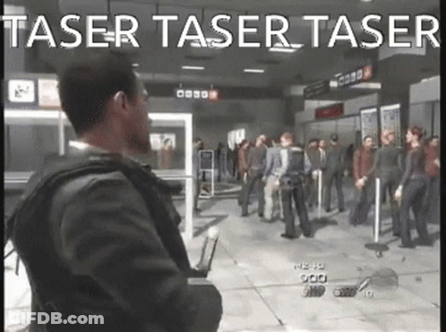 A Man In A Suit Is Standing In Front Of A Crowd In A Video Game With The Words Taser Taser Taser GIF