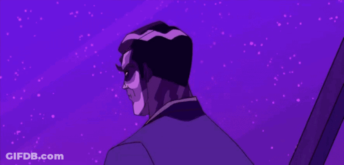 A Man In A Suit Is Standing Next To A Man In A Red Shirt GIF