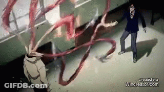 A Man In A Suit Is Standing Next To A Monster With Long Tentacles Coming Out Of It 'S Head . GIF