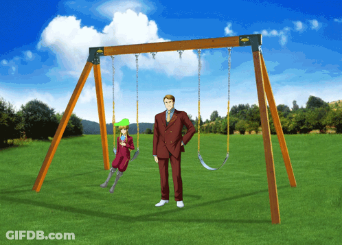 A Man In A Suit Is Standing Next To A Swing Set With A Child On It GIF