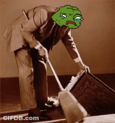 A Man In A Suit Is Sweeping The Floor With A Cartoon Face On His Face GIF