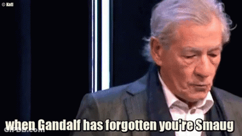 A Man In A Suit Is Talking About When Gandalf Has Forgotten You 'Re Smaug GIF