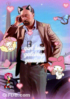 A Man In A Suit Is Talking On A Cell Phone With A Cat Ear Sticker On His Head GIF